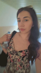 Woman in floral dress moves through Bulgarian educational facility