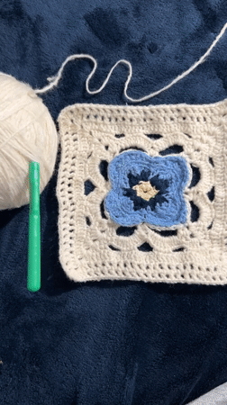 Crocheting granny squares and hanging out with a conure