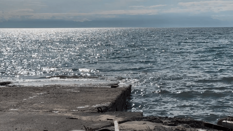 Choppy waters and overcast skies observed at Greek pier