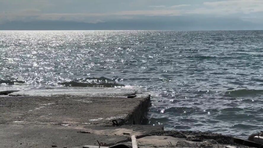 Choppy waters and overcast skies observed at Greek pier