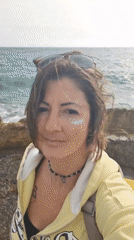Woman photographed at Jordan beach during afternoon visit