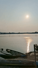 Lhokseumawe waterfront: fishing floats, egrets, and everyday movement
