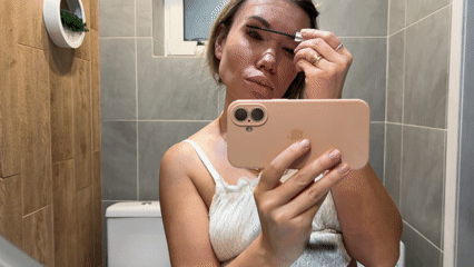 Morning routine documented in Votkinsk home with cat