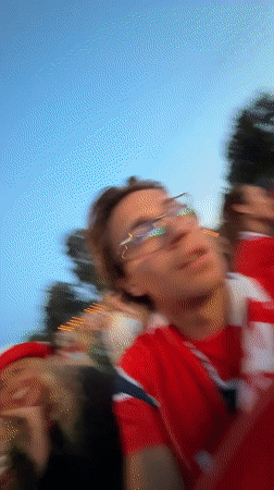 Oslo crowd watches outdoor soccer screening in red