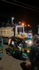 Evening street commerce bustles in Bukuru, Nigeria