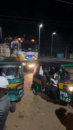 Evening street commerce bustles in Bukuru, Nigeria