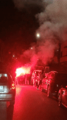 Evening street activity and flares documented in Salé, Morocco