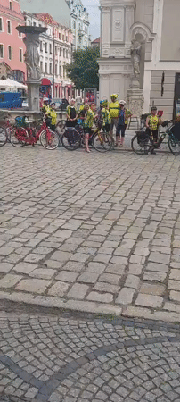 Cycling group assembles on cobblestone streets for organized ride