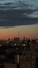 City skyline at dusk, ground and aerial views