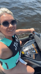 Woman's lakeside recreation day captured in 18 memories