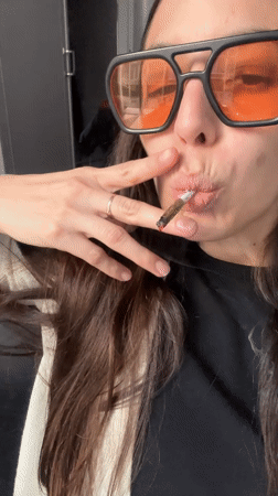 Woman photographed smoking cannabis in Buenos Aires