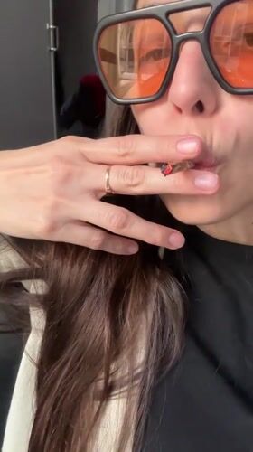 Woman photographed smoking cannabis in Buenos Aires