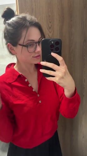 Woman takes playful bathroom selfies in Balatonlelle, Hungary