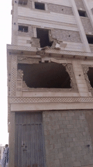 Jeddah street life: soccer games, aircraft overhead, damaged building