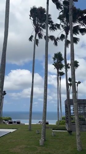 Poolside views and resort sculptures at a Kuta Selatan property