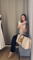 Woman takes selfies in Kyiv dressing room
