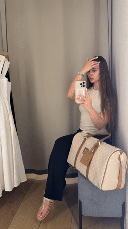 Woman takes selfies in Kyiv dressing room