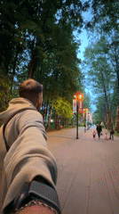 Evening park scenes captured in Dolgoprudny, Russia memorial area