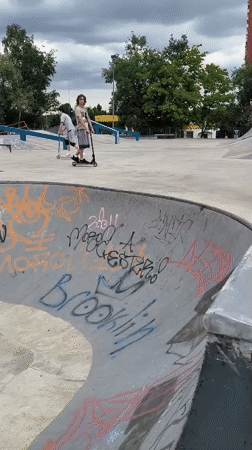 Scooter riding and tricks at a Moscow skatepark