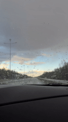 Driver records rainy highway journey near Кондратово, Russia