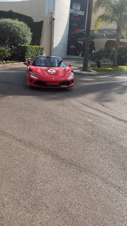 Red Ferrari convertible spotted driving through Monaco streets