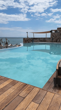 Luxury resort pool overlooking ocean documented in Greece