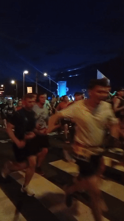 Nighttime running race draws crowds through illuminated Wrocław streets