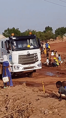 Daily life documented on Tamale's unpaved streets amid development