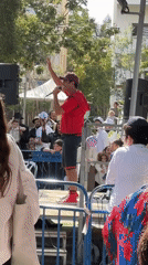 Street performer draws crowd at outdoor Tel Aviv gathering