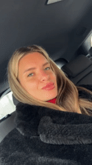 Woman photographed in car backseat in Berlin