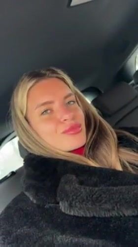 Woman photographed in car backseat in Berlin