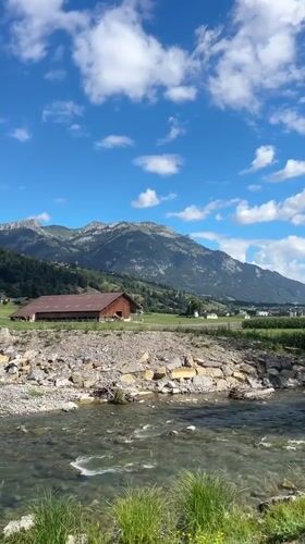 Clear stream and lush banks in the Swiss countryside