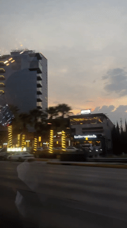 Evening street scene captured in San Bernardino Tlaxcalancingo, Mexico