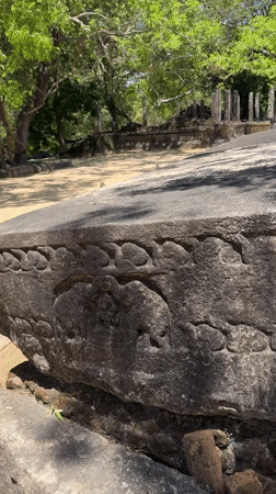 Tourists document ancient Buddhist ruins at Polonnaruwa heritage site