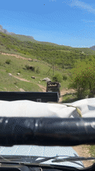 Open-top jeep observed on dirt road near Haghartsin, Armenia