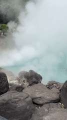Tourists document morning visit to Beppu's famous Hell hot springs