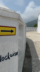 Directional signage captured at scenic viewpoint in Pokhara, Nepal