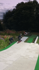 Snowboarder practices on artificial slope in Ushuaia, Argentina