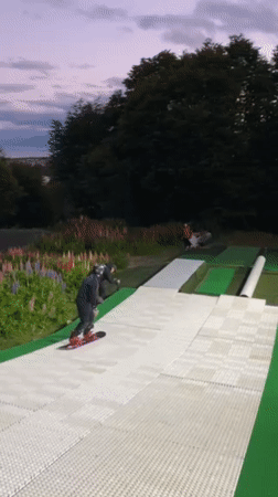Snowboarder practices on artificial slope in Ushuaia, Argentina