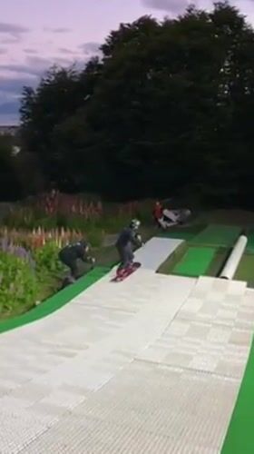 Snowboarder practices on artificial slope in Ushuaia, Argentina