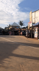 Afternoon street life and market activity recorded in Nigerian towns