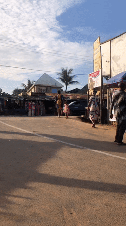 Afternoon street life and market activity recorded in Nigerian towns