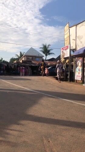 Afternoon street life and market activity recorded in Nigerian towns