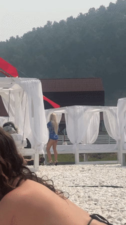Sunny morning at a Russian riverside resort beach