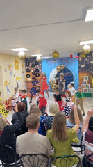 Children's dance performance draws audience of recording parents