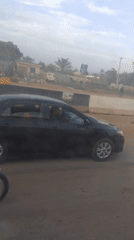 Morning commute and street activity across two Abuja neighborhoods