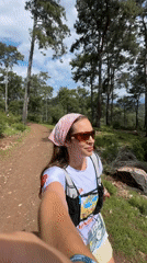 Runner records selfie video during race event