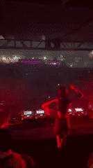 DJ performs for large crowd in Los Angeles nightclub