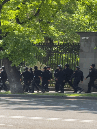 Police gather near ornate fence in Yerevan Armenia