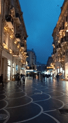 Evening pedestrian activity captured on Baku city streets